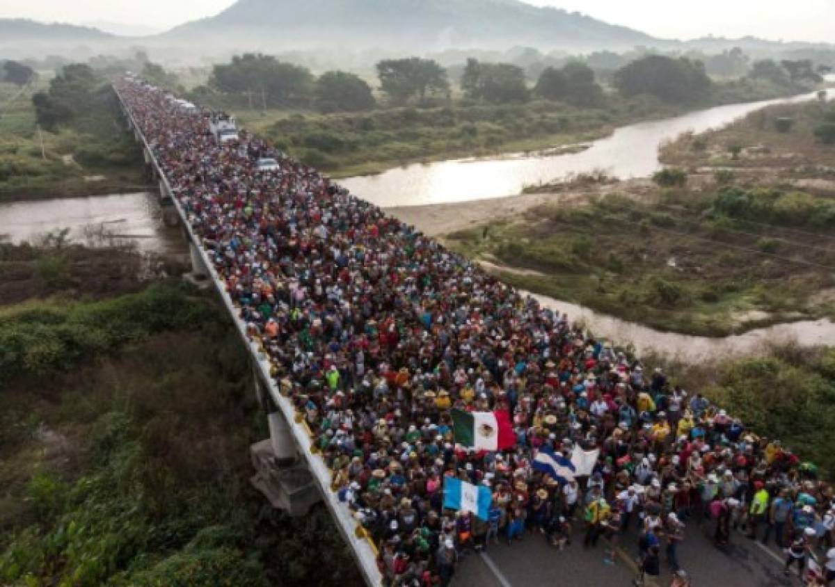 Nuevo premio para fotógrafo mexicano de AFP por imagen en la que iban migrantes hondureños  