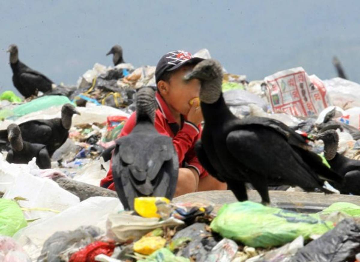 Honduras: El cruel mundo de los niños pepenadores en la capital