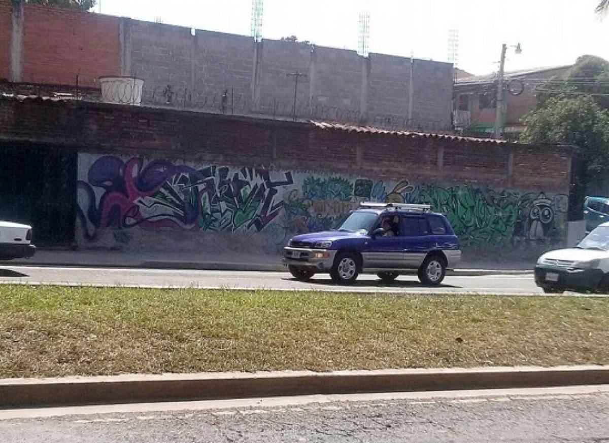 Borran grafitis en la capital de Honduras