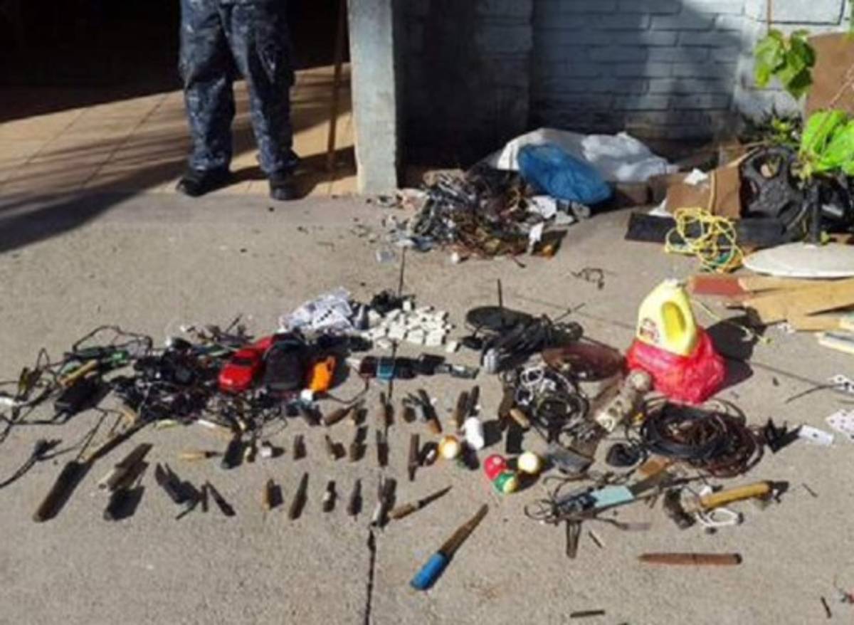 Hallan armas y celulares en penal de Comayagua