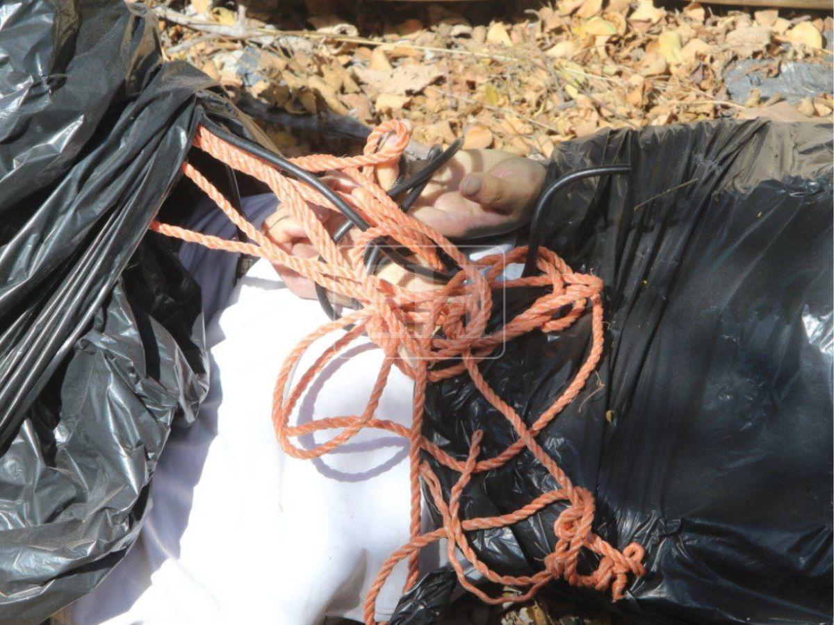 Con las manos amarradas y dentro de bolsas: así hallaron un cuerpo sin vida en Tegucigalpa