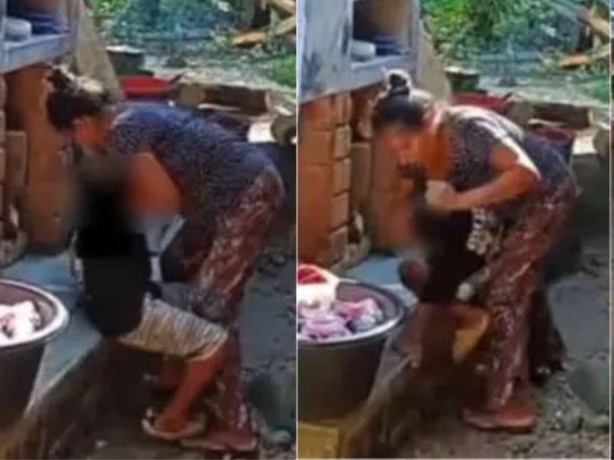 Le puso su pie sobre el cuello: madre es captada dando brutal golpiza a su pequeño hijo