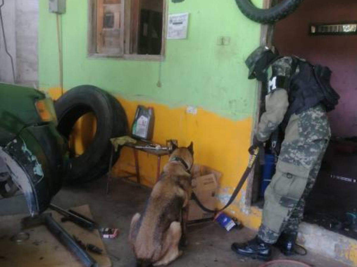 El taller mecánico donde fueron asesinados dos personas con arma de fuego.