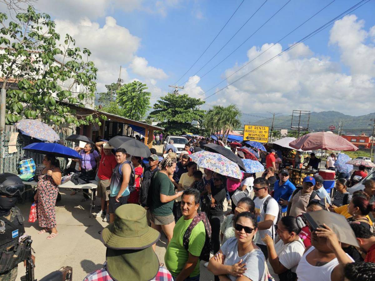 Enormes filas e incertidumbre: hondureños víctimas de Koriun intentan recuperar su dinero