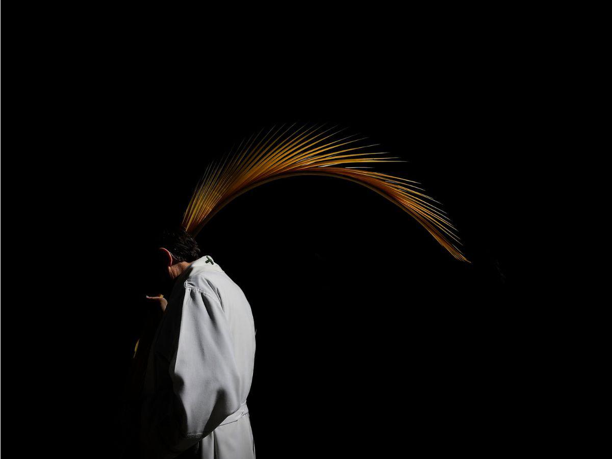 Fieles de todo el mundo celebran el Domingo de Ramos con palmas e imágenes religiosas