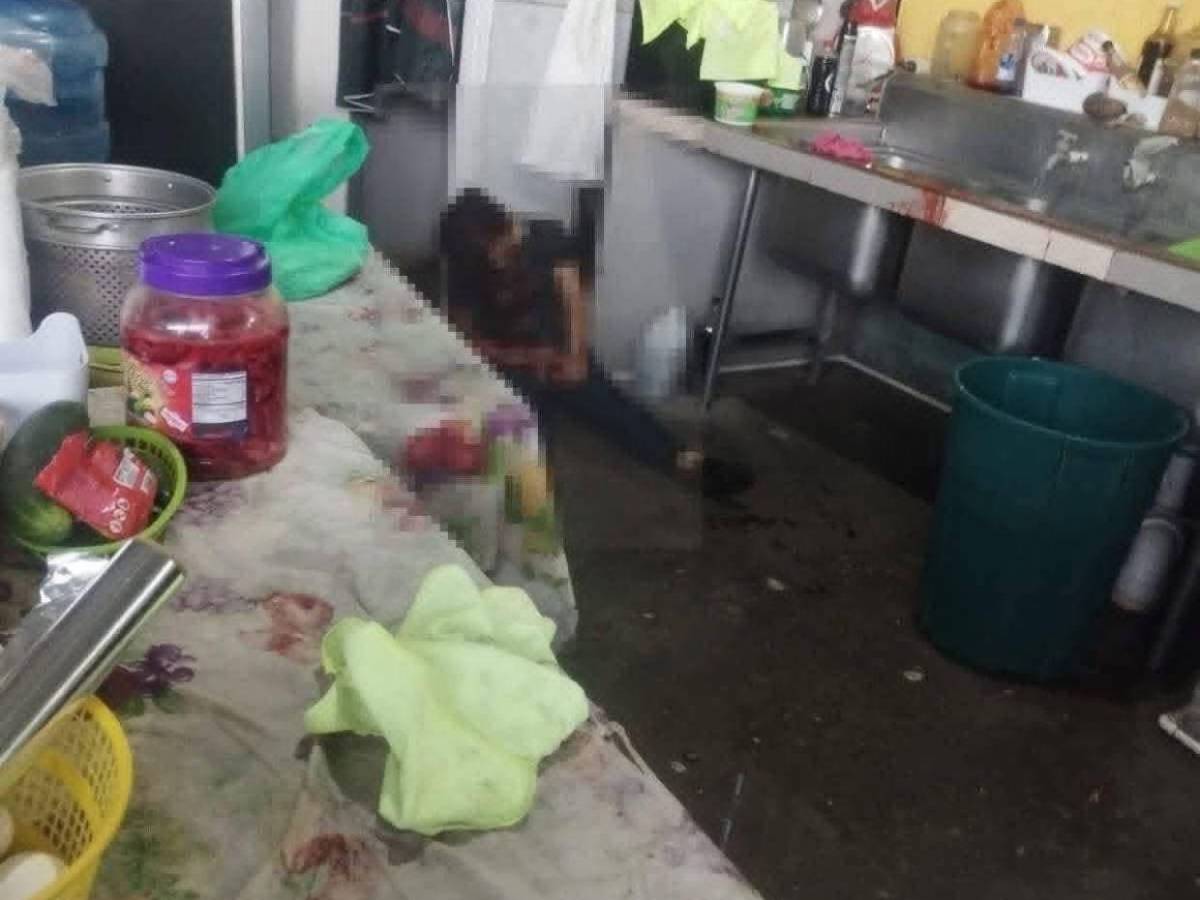 Familiares esperan restos de las víctimas de la matanza en San Manuel, Cortés