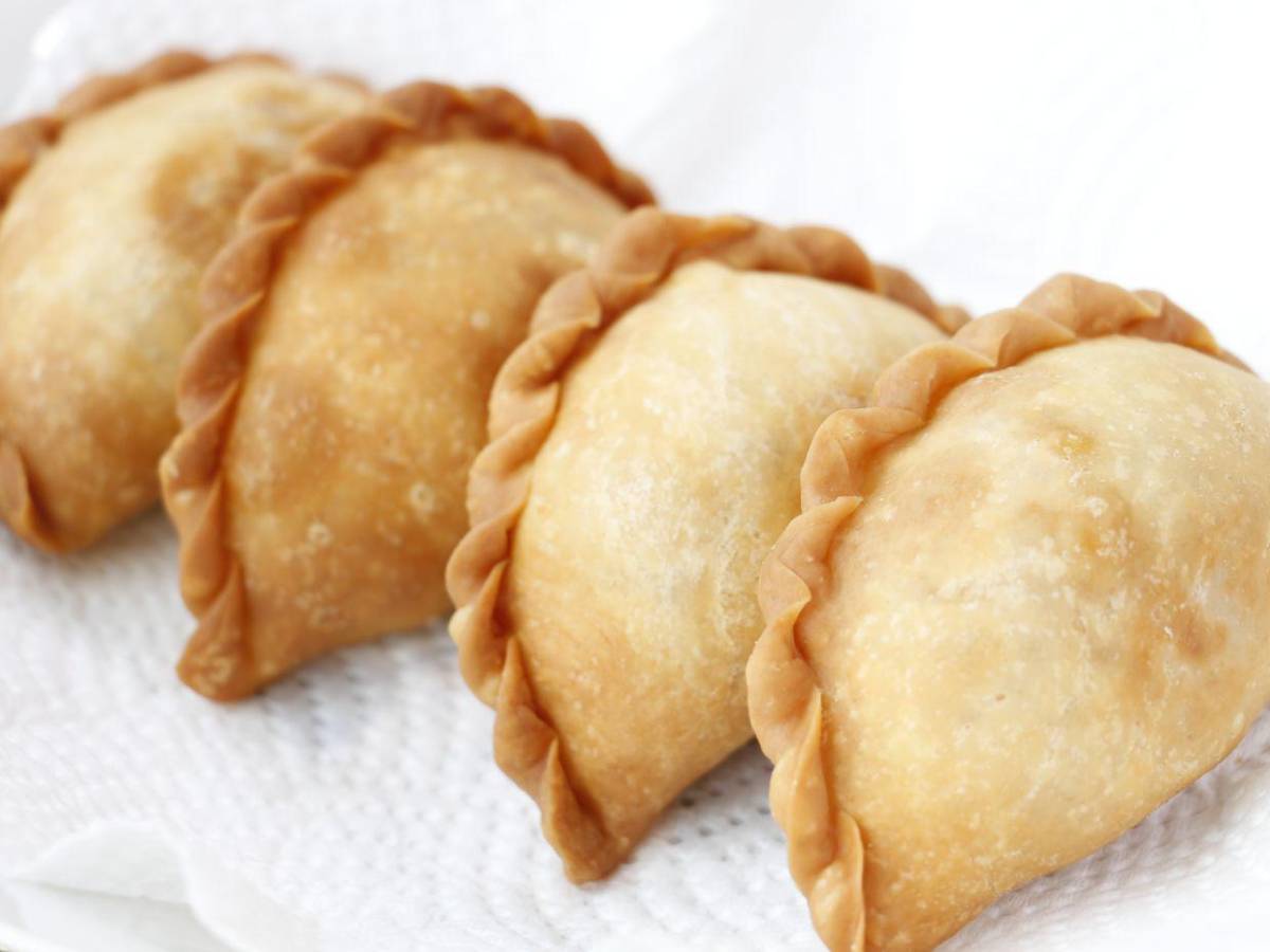 Mujer mata a 40 pandilleros dándoles empanadas envenenadas en Haití Mujer mata a 40 pandilleros dándoles empanadas envenenadas en Haití