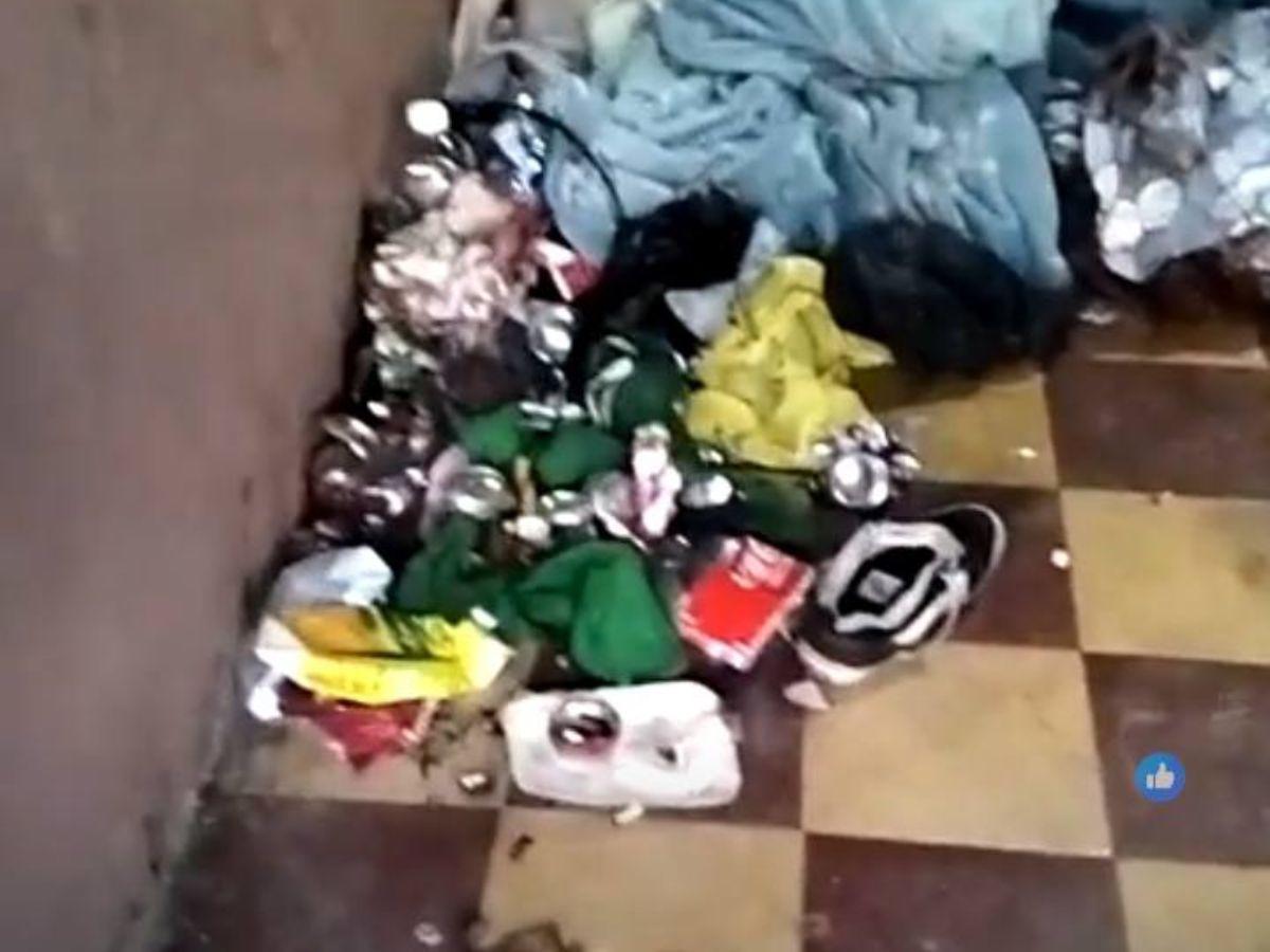 Ropa tirada y sangre: así era la cuartería donde hallaron dos cuerpos encostalados bajo una cama