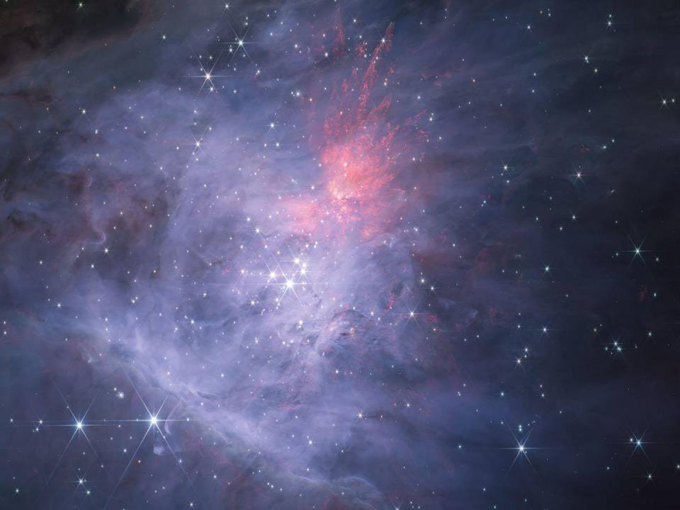 Una imagen compuesta infrarroja del interior de la Nebulosa de Orión y del Cúmulo del Trapecio.