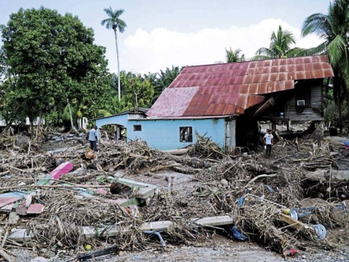 Casas totalmente destruidas son parte del ambiente en El Progreso.