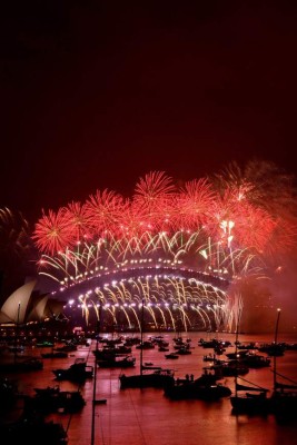 Fuegos artificiales de Nochevieja alumbran el cielo de Sydney (Fotos)
