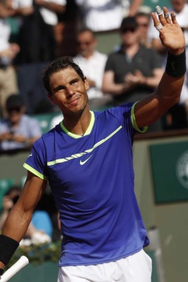 Rafael Nadal y Novak Djokovic avanzan, Olivo sorprende a Tsonga en el Abierto de Francia
