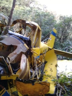 Encuentran cuerpo del piloto de la nave fumigadora en la zona boscosa del Lago de Yojoa