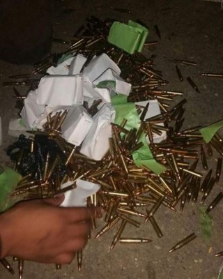 Caen dos hondureños y guatemalteco con dólares y municiones