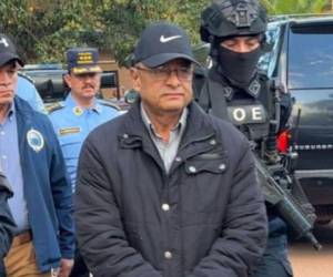 Midence Oqueli Martínez Turcios, exdiputado hondureño, al momento de ser extraditado hacia Estados Unidos desde Tegucigalpa en 2023, acusado por delitos relacionados con el narcotráfico.