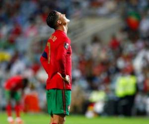 El astro de Portugal Cristiano Ronaldo reacciona durante un partido eliminatorio para la Copa del Mundo 2022 contra la República de Irlanda en el estadio Algarve, en Faro, Portugal. Foto: AP