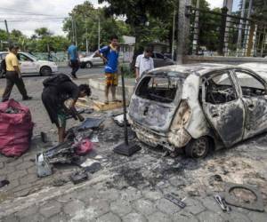 Incidentes entre opositores, policías y grupos afines al gobierno fueron unos de los más violentos que se vivieron desde que el 18 de abril. Foto AFP