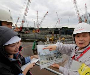 El ministro olímpico Shunichi Suzuki dijo que la construcción avanza según el cronograma establecido y elogió la eficiencia de las obras. Foto: AP