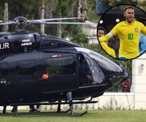 El helicóptero que transporta al futbolista brasileño Neymar llega al complejo deportivo Granja Comary en Teresopolis, Brasil. Foto: Mauro Pimentel/Agencia AFP.