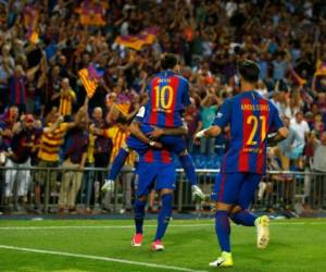 Lionel Messi al momento de celebrar su anotación en el triunfo 3-1 del Barcelona ante el Alavés en la Copa del Rey (Foto: Agencias/AP)