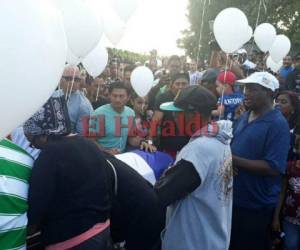 Con globos blancos, así le dijeron adiós a Juan Carlos García. (Fotos: Luis Licona / Grupo Opsa)