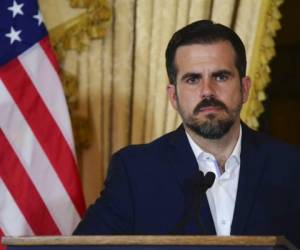 Manifestantes marcharon el lunes por la capital por tercer día para exigir la renuncia de Rosselló. Foto: AP.