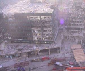 Esta imagen retrata la devastación y escombros después del ataque en las Torres Gemelas. Foto: Jason Scott