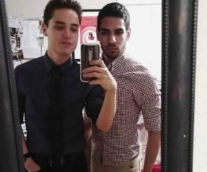 Taiwans gay activist Chi Chia-Wei (R) signs a wedding certificate for gay couple Shane Lin and Marc Yuan (L) after registering at the Household Registration Office in Shinyi District in Taipei on May 24, 2019. (Photo by Sam YEH / AFP)