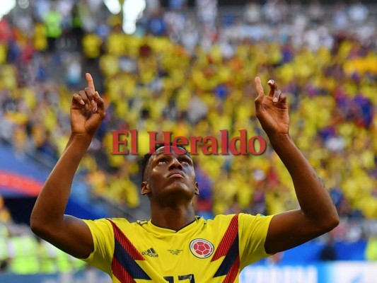 El defensor colombiano Yerry Mina celebra después de anotar un gol durante el partido de fútbol del Grupo H de la Copa Mundial 2018. Foto: Agencia AFP.