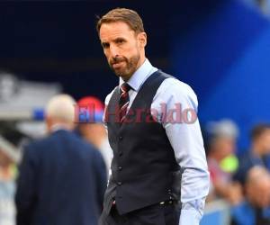 Gareth ya ha sido señalado como un ícono de la moda, por su particular atuendo en los partidos de Rusia, que incluye corbata y chaleco. (Foto: AFP)