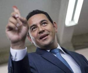 El presidente Jimmy Morales, vinculado a una red de corrupción en la campaña de 2015. Foto AFP