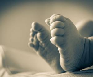 La bebé, de una semana de nacida, murió tras recibir cinco disparos.