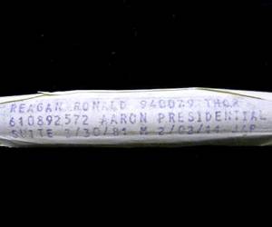 This undated image released by PFCAuctions shows a vial containing Ronald Reagan's dried blood residue. A Channel Islands online auction house has angered Ronald Reagan's foundation by claiming to offer a vial that once contained his blood. The auctioneers say it was used by the laboratory that tested Reagan's blood when he was hospitalized after a 1981 assassination attempt in Washington. Bidding for the vial had passed the 7,000 pound ($11,000) mark Tuesday May 22, 2012. (AP Photo/PFCAuctions)