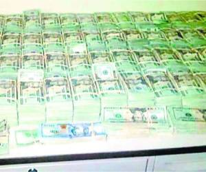 Dinero decomisado en la hacienda de los Valle en Potrerillos, Copán.