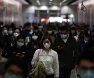 Pese a las medidas de contención la epidemia sigue propagándose fuera de China continental. Foto AP