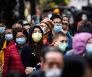 Los estadounidenses salieron la ciudad de Wuhan en China, epicentro del brote de coronavirus. Foto AFP