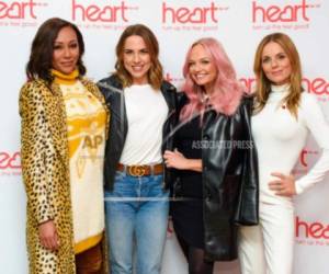 En esta fotografía del miércoles 7 de noviembre de 2018 se muestra a las Spice Girls, Melanie Brown (izquierda), Melanie Chisholm, Emma Bunton y Geri Horner durante un espectáculo en Londres.