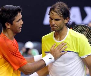 Australian Open men's single's champion Roger Federer of Switzerland takes a selfie with the Norman Brookes Challenge Cup at Government House in Melbourne, Australia, Monday, Jan. 29, 2018. Federer defeated Croatia's Marin Cilic in Sunday's final. (Fiona Hamilton/Tennis Australia via AP)