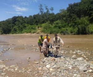 El cuerpo fue encontrado cinco días después de haber desaparecido en la corriente del río. (Foto: Bomberos de Honduras)