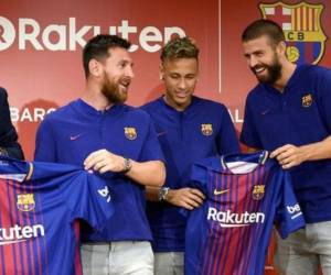 Leo Messi, Neymar y Gerard Piqué, en un evento en Japón. (Foto: AFP)