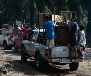 Copeco ordenó el domingo evacuaciones obligatorias en el territorio nacional. Foto: AFP