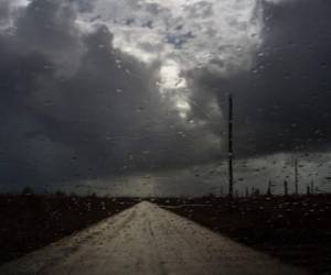 This satellite image obtained from NOAA/RAMMB, shows Tropical Storm Humberto at 15:10 UTC on September 18, 2019 as it moves off the US east coast in the Atlantic Ocean. - Hurricane Humberto strengthened to a major Category 3 storm on September 17, 2019 and was expected to pass near Bermuda, threatening it with dangerous waves and heavy rain, the US National Hurricane Center said. 'Hurricane conditions are expected to reach Bermuda by the night of September 18, 2019 and continue into early Thursday morning,' the Miami-based NHC said. 'Some fluctuations in intensity are likely during the next day or so, but Humberto should remain a powerful hurricane through Thursday,' it said. (Photo by Lizabeth MENZIES / NOAA/RAMMB / AFP) / RESTRICTED TO EDITORIAL USE - MANDATORY CREDIT 'AFP PHOTO / NOAA/RAMMB/HANDOUT' - NO MARKETING - NO ADVERTISING CAMPAIGNS - DISTRIBUTED AS A SERVICE TO CLIENTS