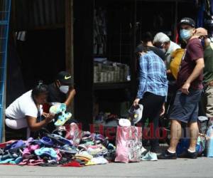 La mayoría de empresas formales suman más de 120 días sin abrir por la pandemia del covid-19. Foto: Emilio Flores/ EL HERALDO