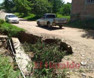 La red vial de tierra de varios barrios y colonias quedó destrozada tras las fuertes lluvias de la semana anterior. Foto: El Heraldo