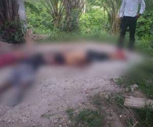 El homicidio múltiple se registró la tarde de este martes en una aldea de Puerto Cortés, norte de Honduras. Foto: Cortesía.