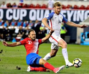 Costa Rica forward Marco Urena, left, scores as United States' Tim Ream defends during the first half of a World Cup qualifying soccer match, Friday, Sept. 1, 2017, in Harrison, N.J. (AP Photo/Julio Cortez)