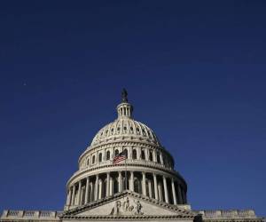 Members of the DC National Guard are deployed outside of the US Capitol in Washington DC on January 6, 2021. - Donald Trump's supporters stormed a session of Congress held today, January 6, to certify Joe Biden's election win, triggering unprecedented chaos and violence at the heart of American democracy and accusations the president was attempting a coup. (Photo by ANDREW CABALLERO-REYNOLDS / AFP)