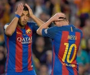 Luis Suárez y Leo Messi, jugadores del FC Barcelona. (AFP)