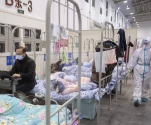 Estas son las principales conclusiones del documento del Centro Chino para el Control y la Prevención de Enfermedades (CCDC): 80,9% de las infecciones se clasifican como leves, 13,8% como graves y sólo 4,7% como críticas. Foto: AFP