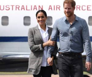 Meghan y Harry realizan una gira por Australia tras anunciar embarazo. Foto: AFP